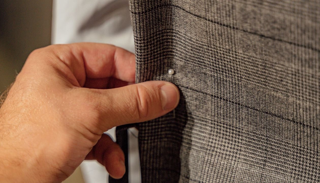 Suit being fitted